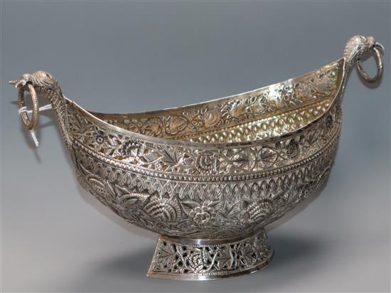 A Kashmiri white metal ring handled kashkul bowl, 12 oz.